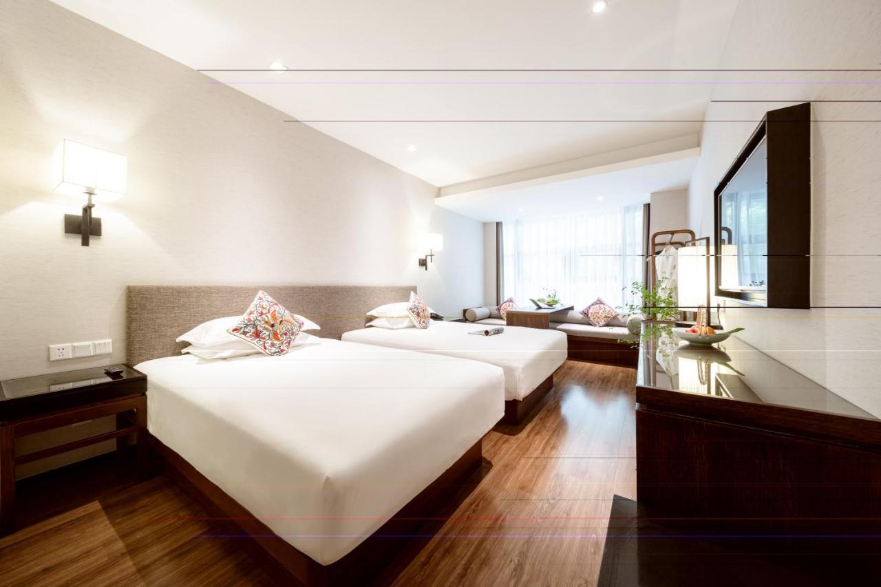Ssaw Boutique South Xuhui Riyueguang Hotel 4*