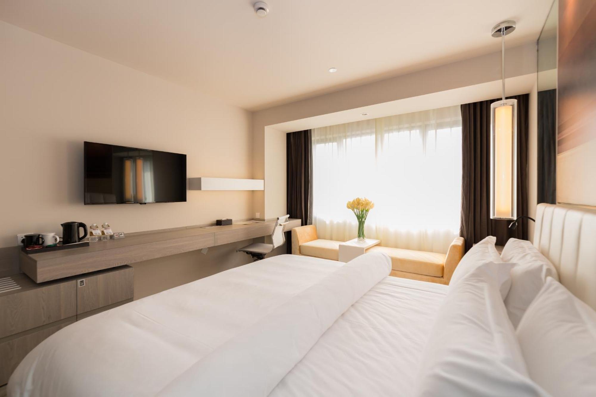 Hotel Jin Jiang Metropolo Hua Ting 4*