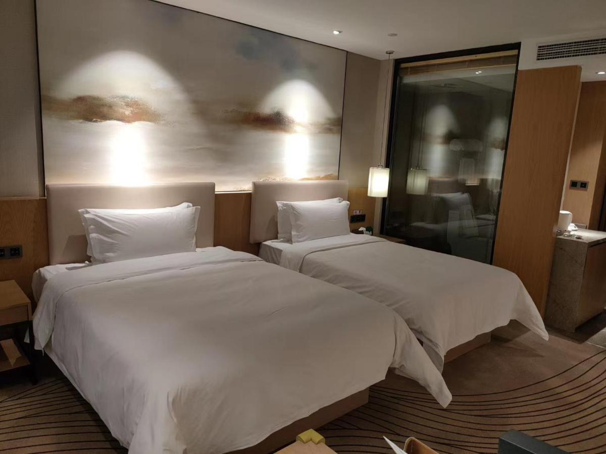 Shanghai Zhoupu Wanxin Hotel 4*