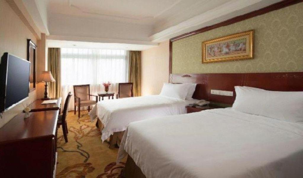 Hotel Vienna International Hongqiao Expo Center Caohejing 4*