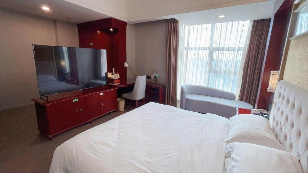 Hotel Vienna International Hongqiao Expo Center Caohejing 4*