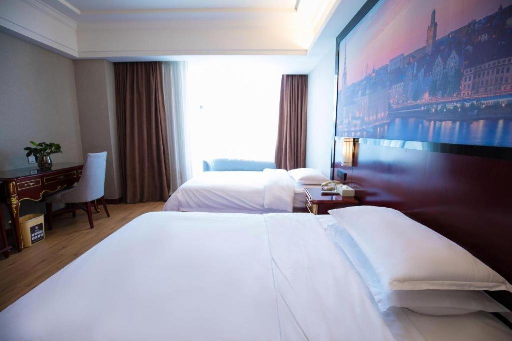 Hotel Vienna International Hongqiao Expo Center Caohejing 4*