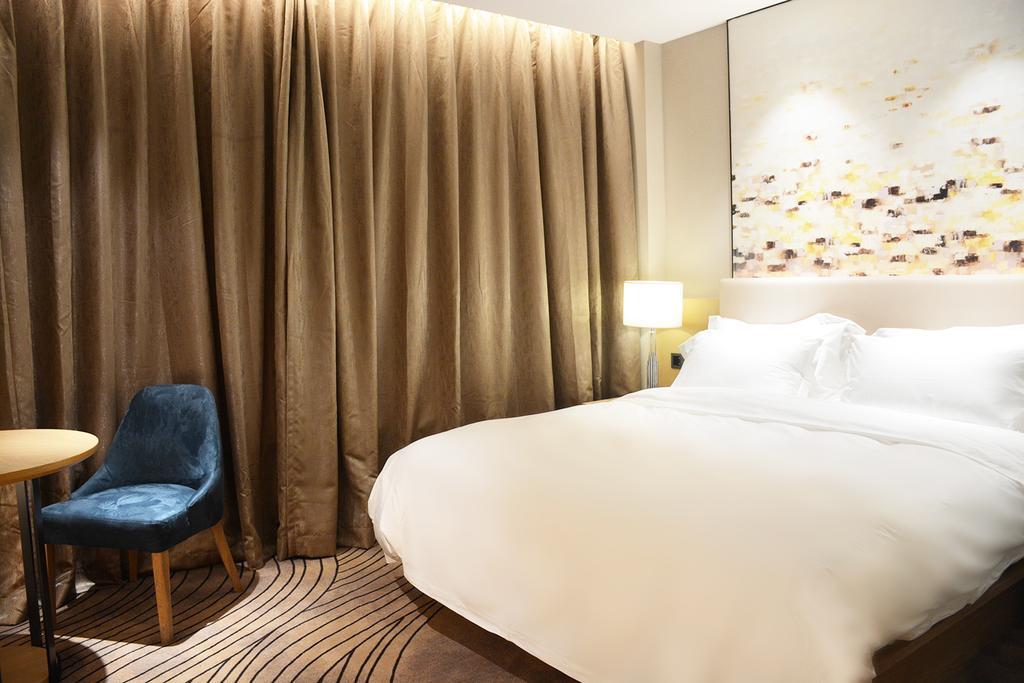 Shanghai Zhoupu Wanxin Hotel 4*
