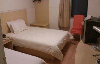Hotel Jingjiang Caobao Railway Station