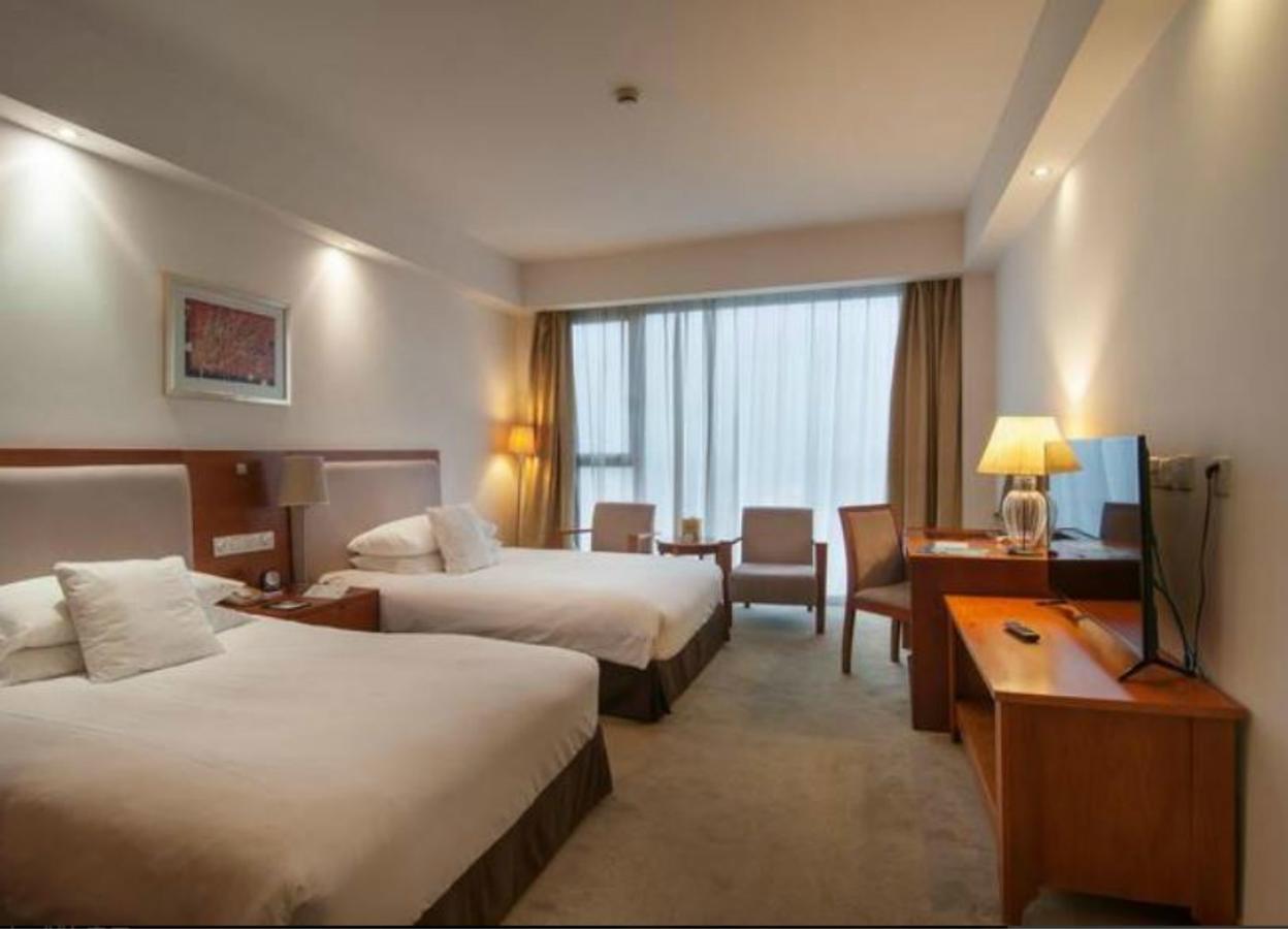 Gloria Plaza Kangqiao Hotel 3*