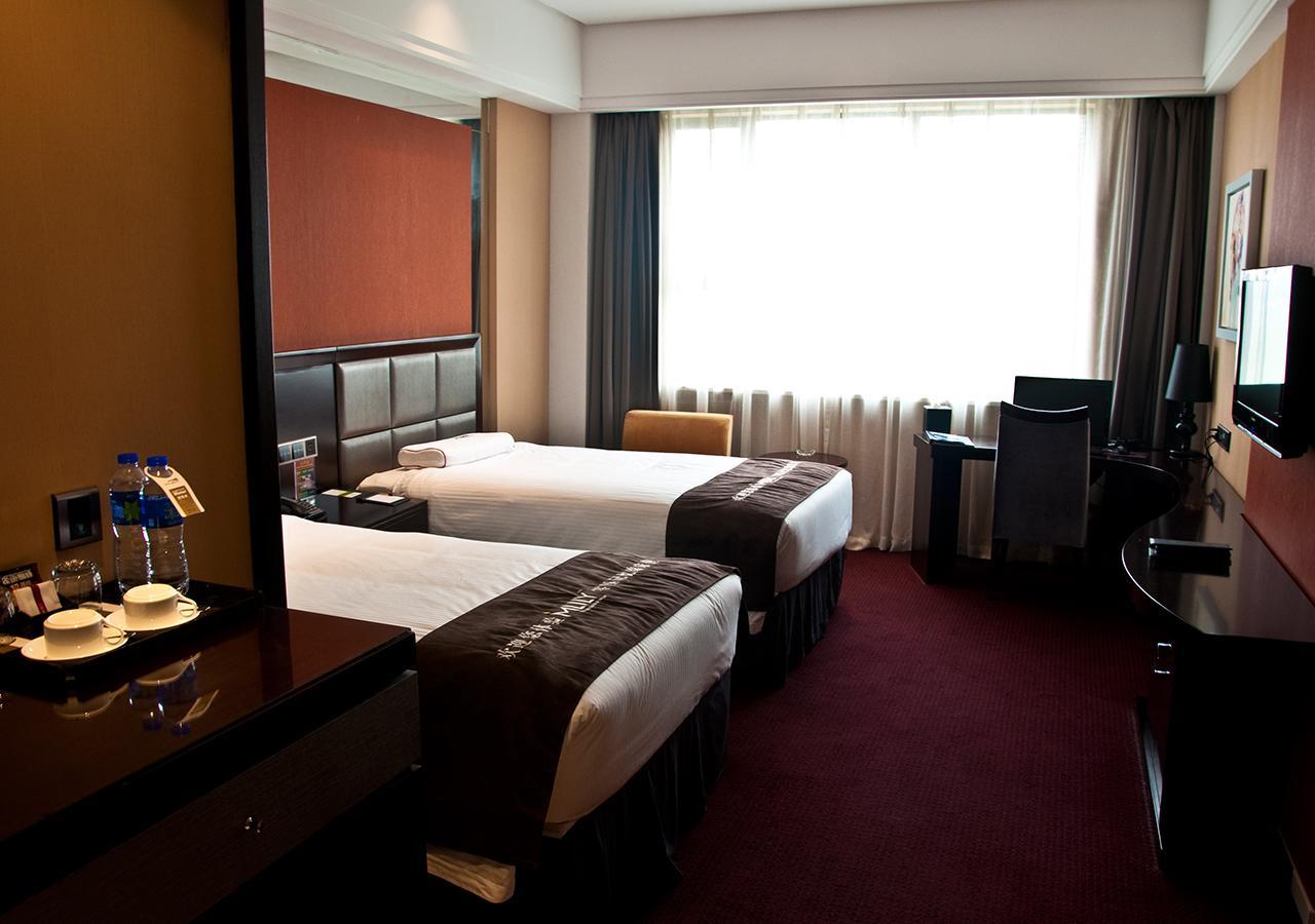 New Century Manju Luoshan @sniec Hotel