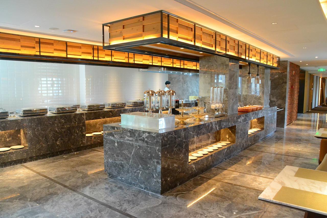 Shanghai Zhoupu Wanxin Hotel 4*
