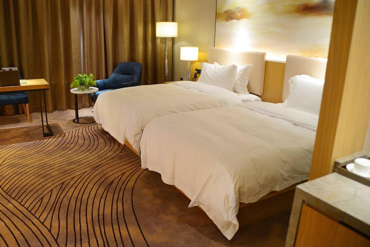 Shanghai Zhoupu Wanxin Hotel 4*
