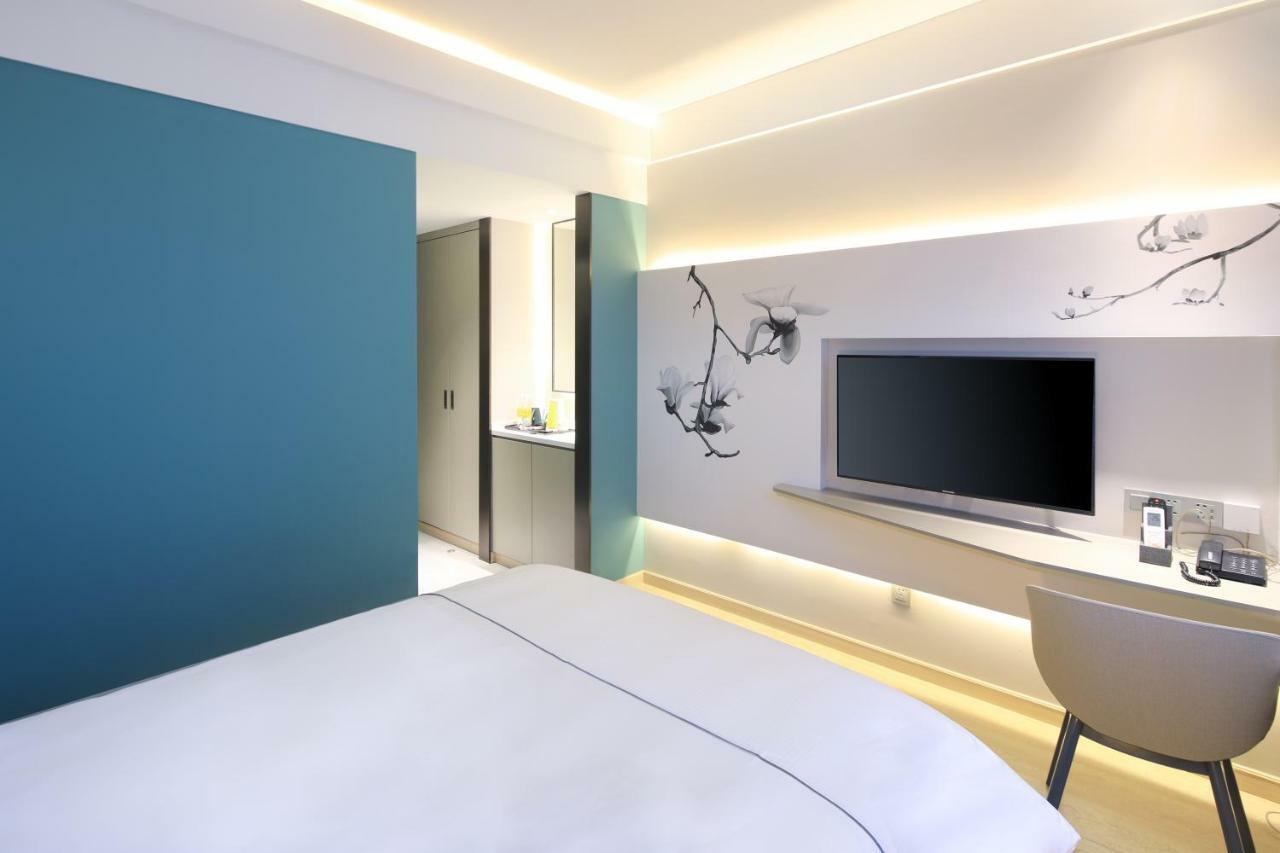 Hotel Magnolia Xintiandi Branch 4*