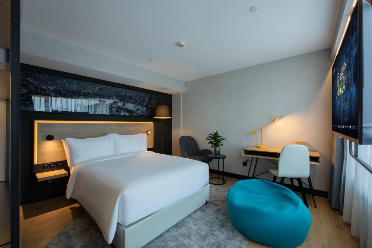 Park By Radisson Huanqiugang Khách sạn 3*