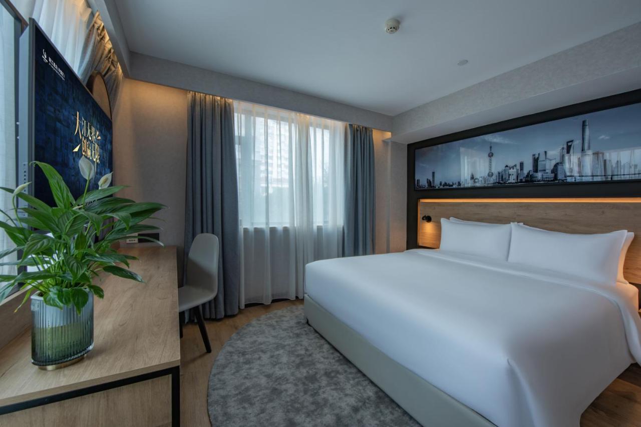 Khách sạn Park By Radisson Huanqiugang 3*
