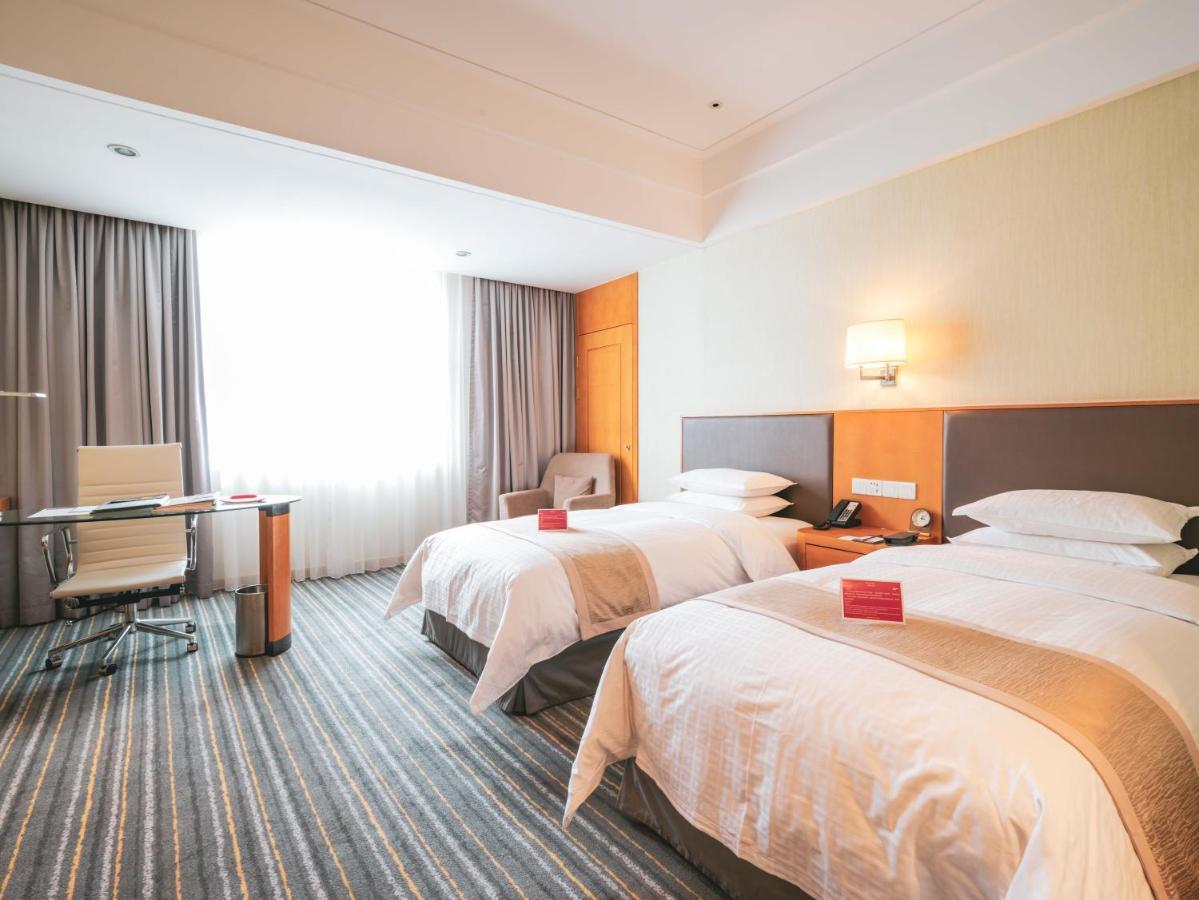Ramada Plaza Pudong Airport - A Journey Starts At The Pvg Airport 4*