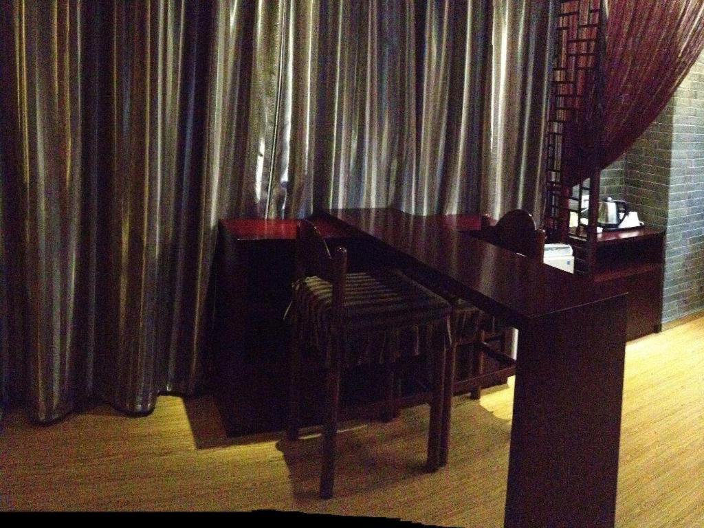 Baolong Homelike - Changxing Branch Hotel
