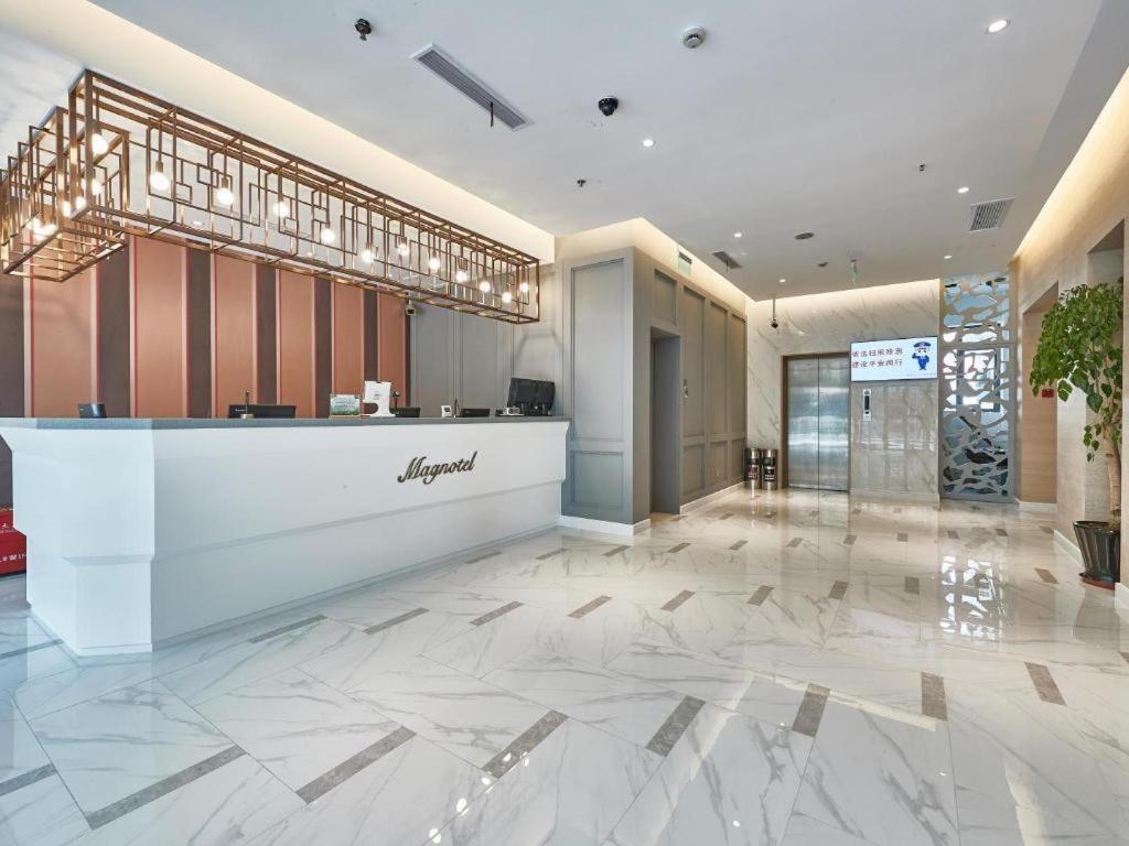 Magnotel Business Minhang Wujing East China Normal Hotel