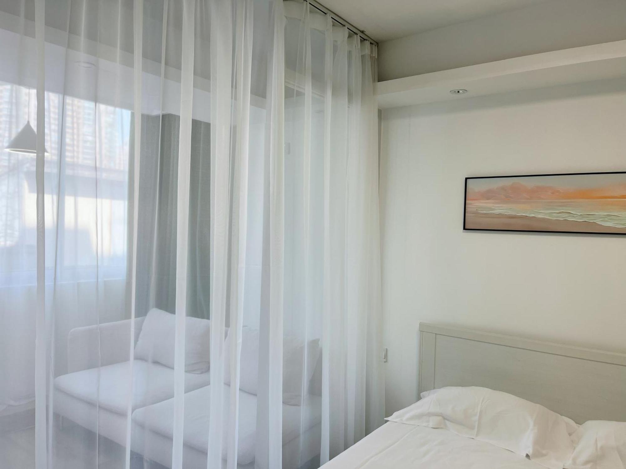 Flowerzhaohuaxishi Apartment