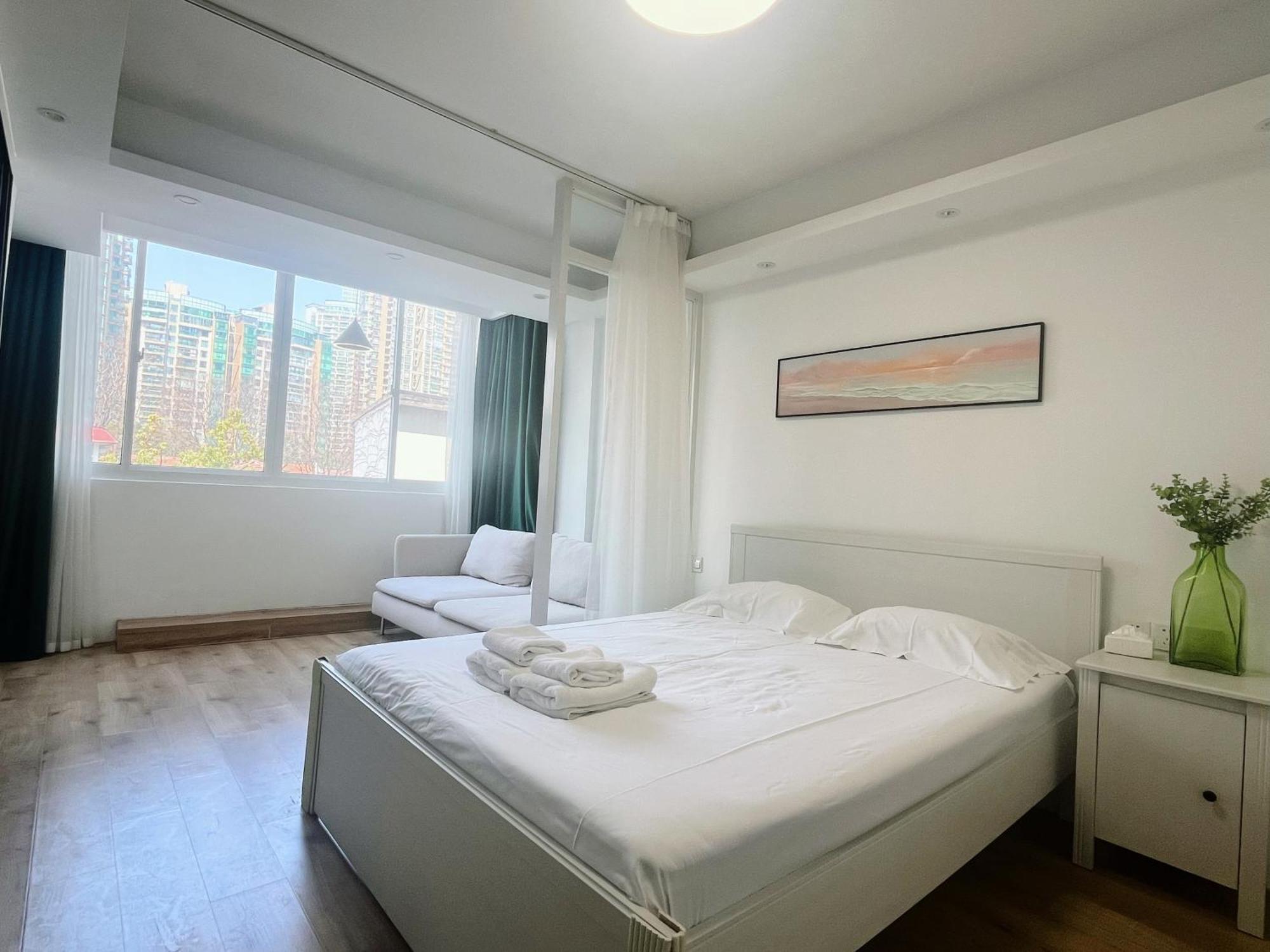 Flowerzhaohuaxishi Apartment *