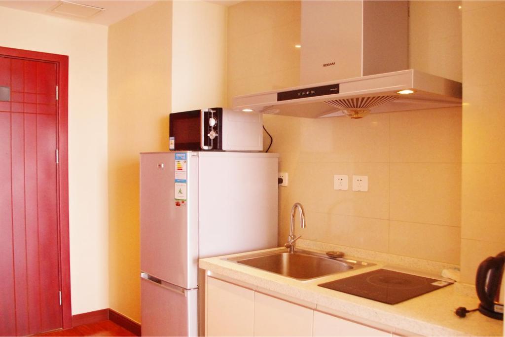 Chenlong Service Apartment - Yuanda Building Aparthotel