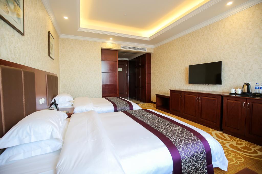 New Knight Royal Airport And International 4* Şanghay