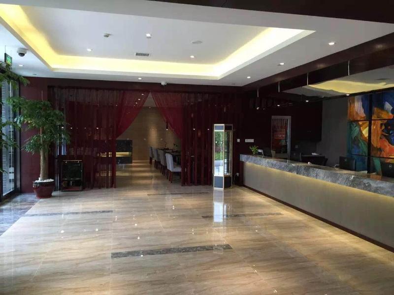 Baolong Homelike Hong Qiao Branch Otel 3*