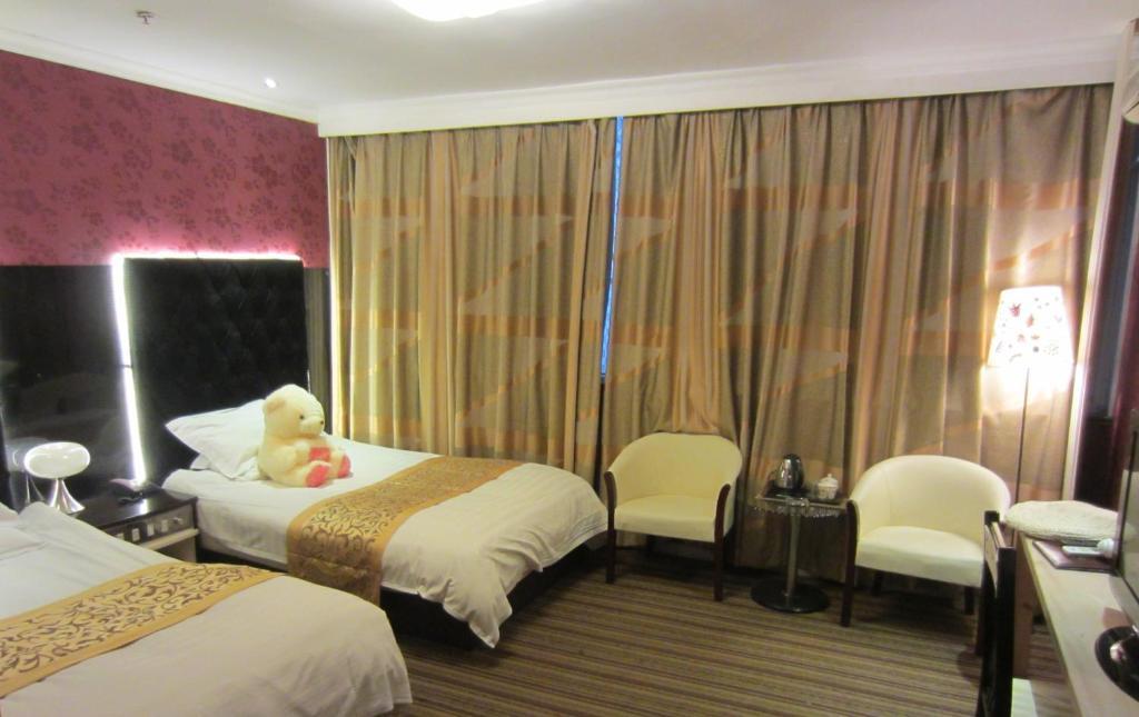 Hotel Jiujiu Holiday