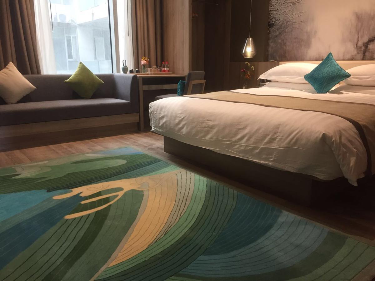 New Century Manju Wanda Plaza Minhang 4*