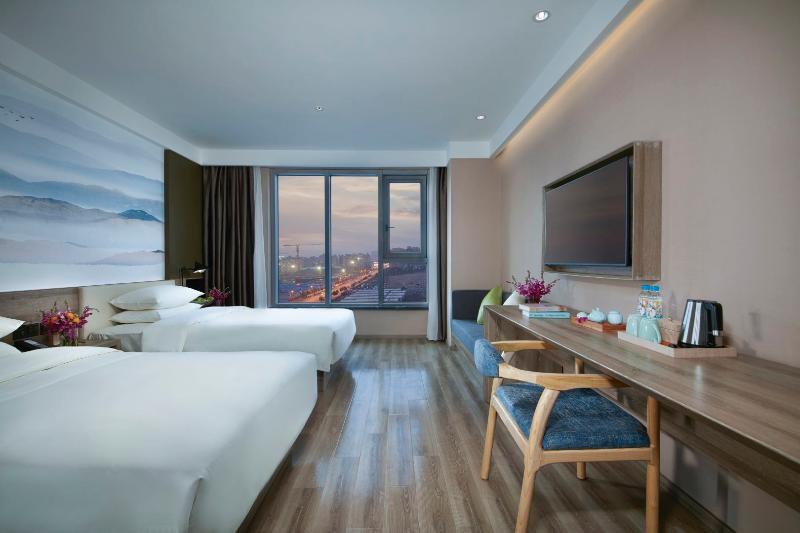 New Century Manju Wanda Plaza Minhang Hotel 4*
