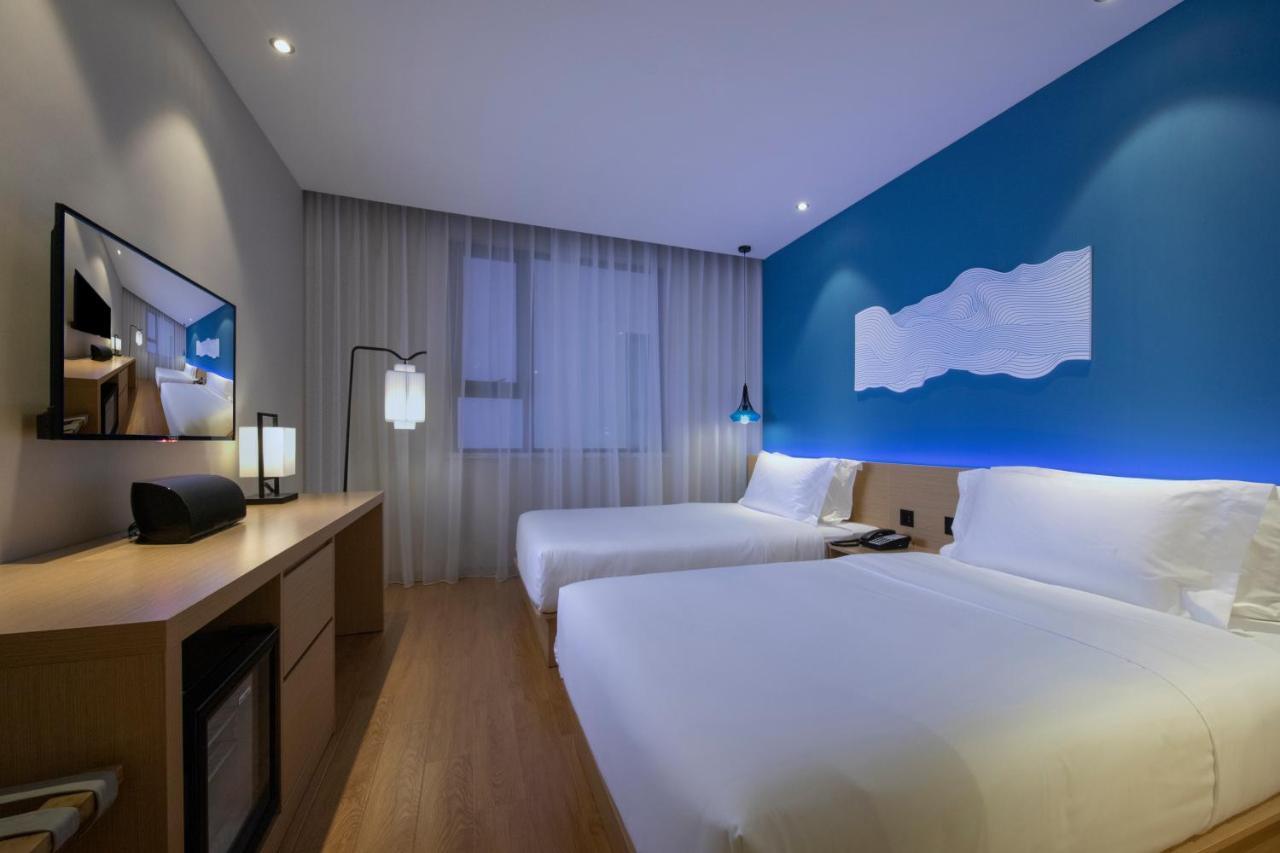 Orange Select Pudong Airport Branch Hotel Xangai